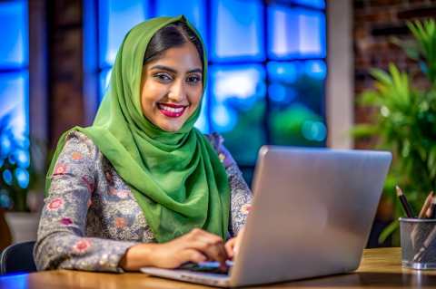 muslim-woman-is-using-laptop-with-green-scarf-it_1236264-388