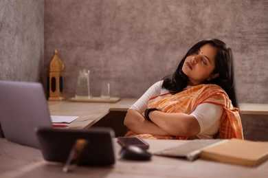 tired-woman-sleeping-her-desk-260nw-2241043443