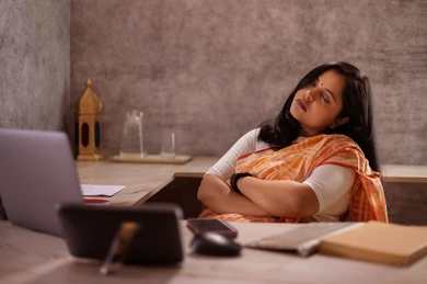 tired-woman-sleeping-her-desk-260nw-2241043443