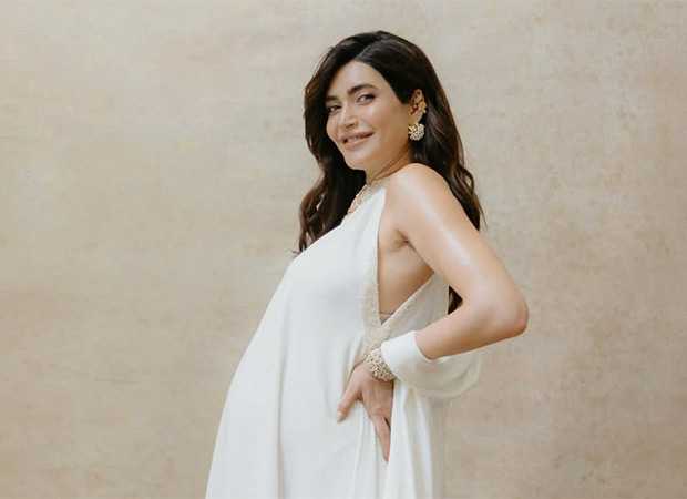 Pregnant-Karishma-Tanna-stuns-in-dreamy-white-maternity-photoshoot-news