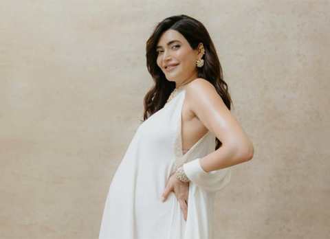 Pregnant-Karishma-Tanna-stuns-in-dreamy-white-maternity-photoshoot-news
