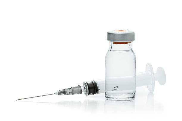 “Vial and Syringe, Isolated on white”